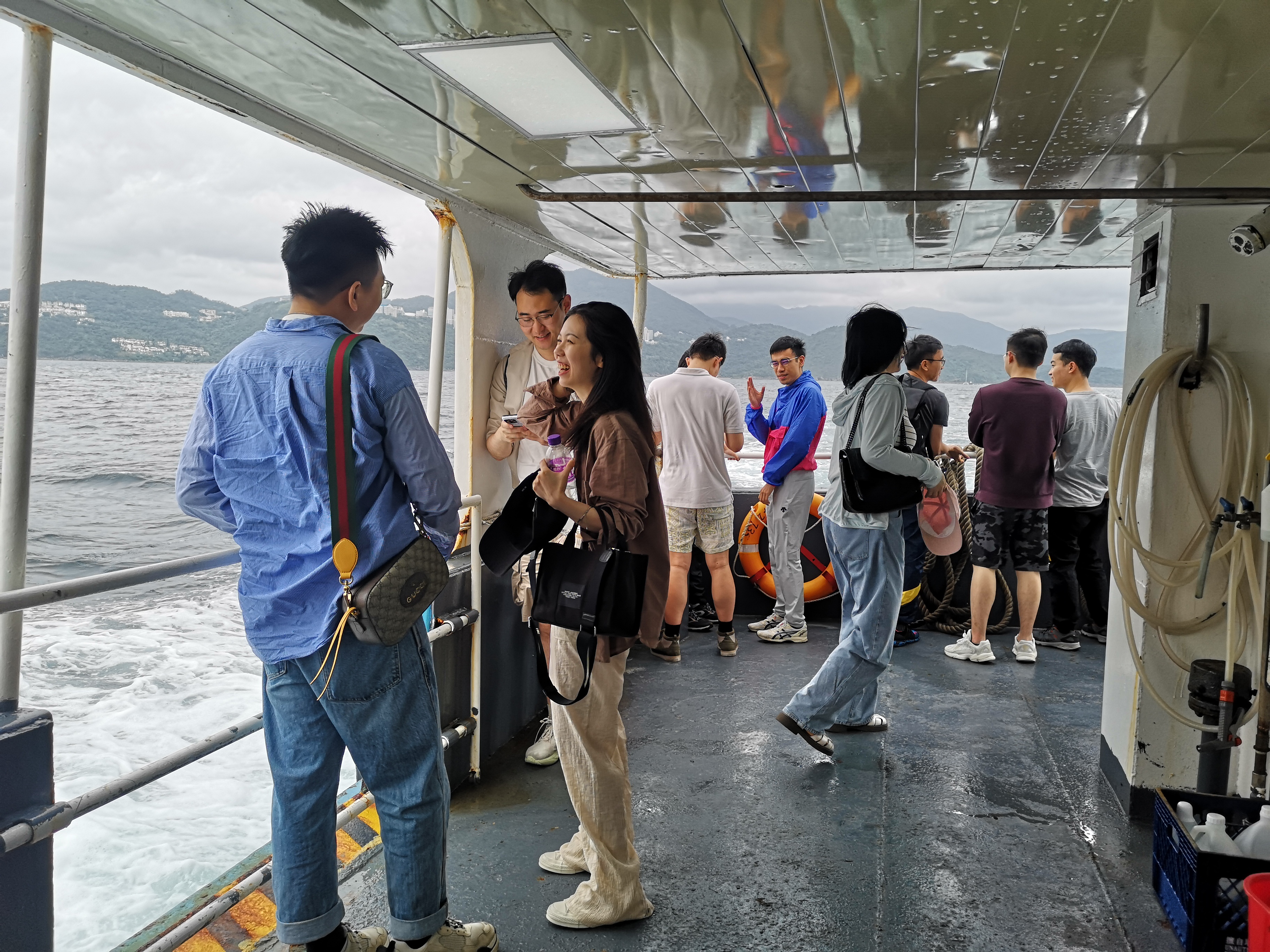Students socializing inside the boat